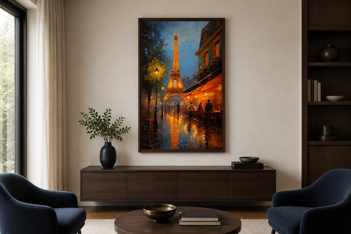 Eiffel Tower and Paris street cafe framed canvas wall art hanging above a dark wood sideboard.