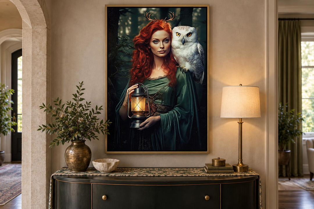 Framed canvas art of Elen of the Ways goddess with red hair, antlers, and a white owl in a forest.