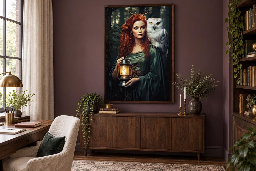 Framed canvas art of Elen of the Ways, a red-haired antlered goddess with a white owl and lantern.