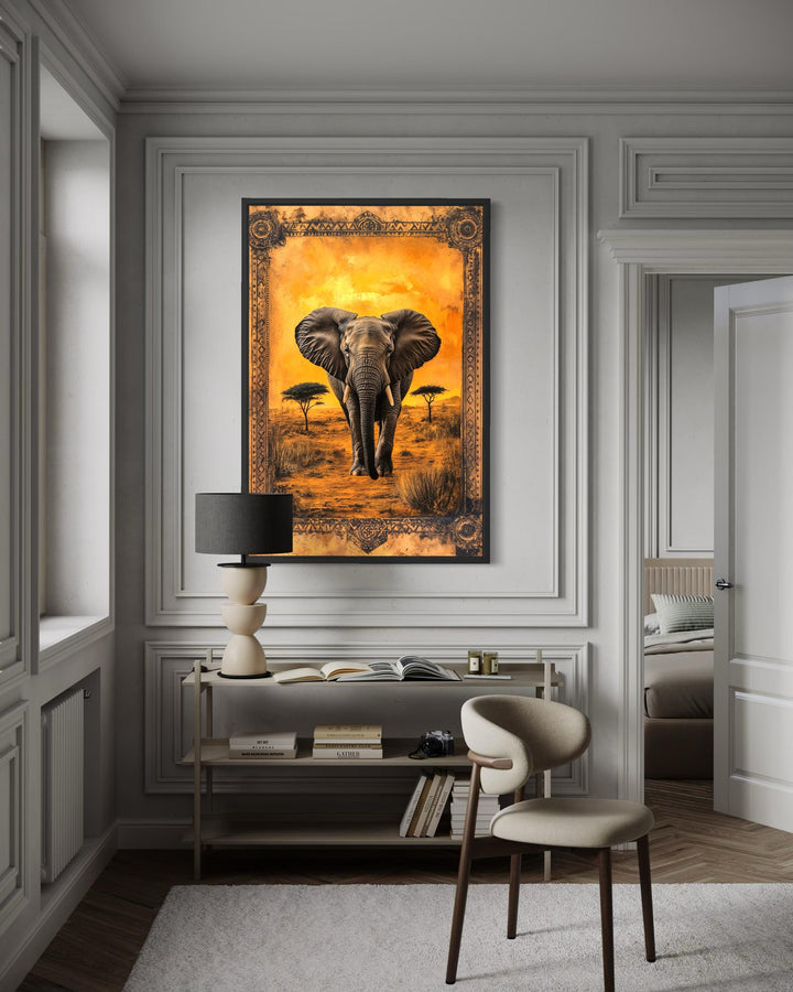 Elephant in African savanna at sunset canvas wall art in a framed, ornate border.