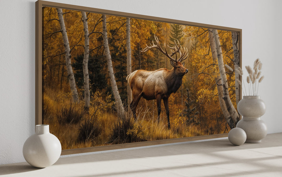 Elk in autumn birch forest rustic framed canvas wall art displayed in a minimalist room.
