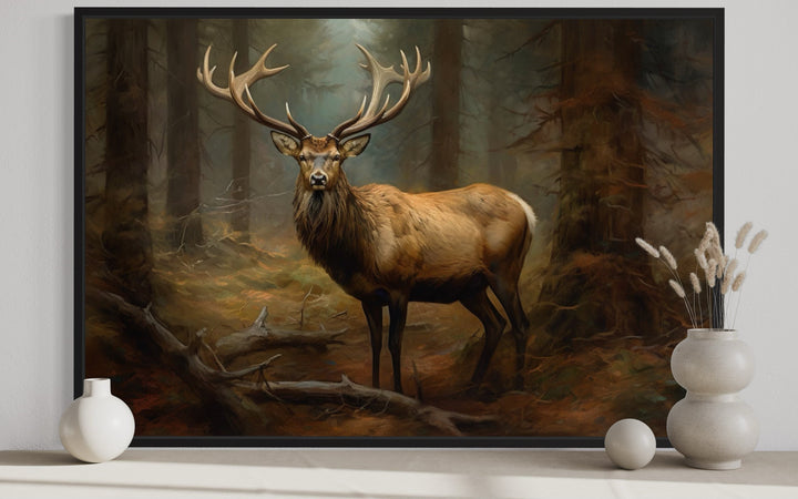 Framed canvas wall art of a majestic elk in a fir tree forest, styled for cabin decor.