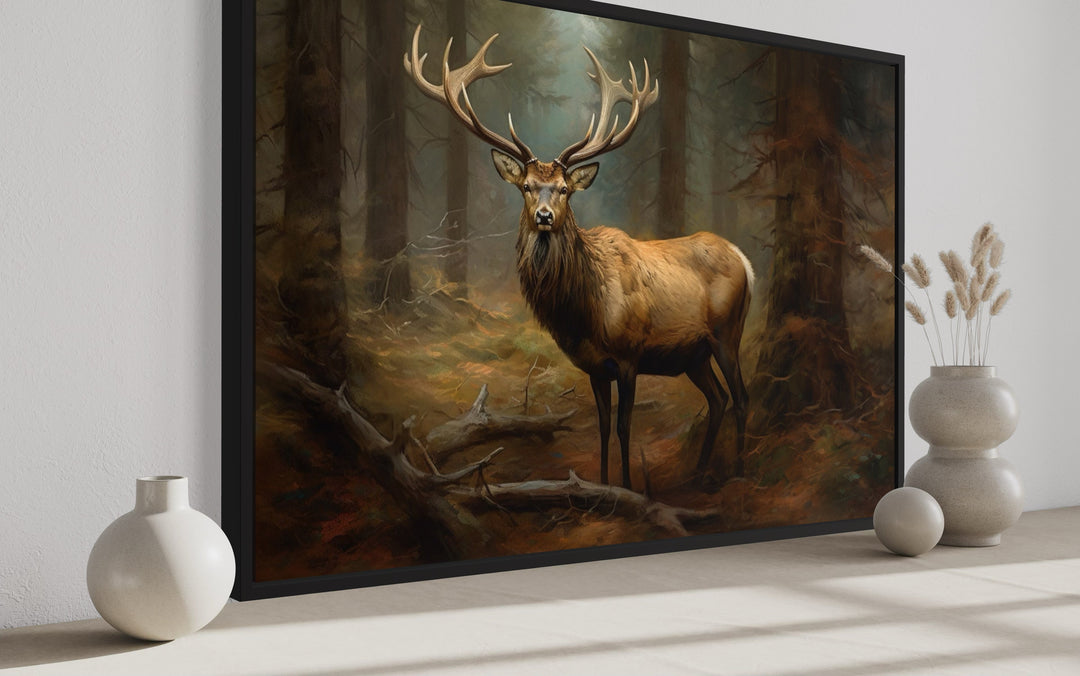 Framed canvas wall art of a majestic elk in a fir tree forest, ideal for cabin decor.