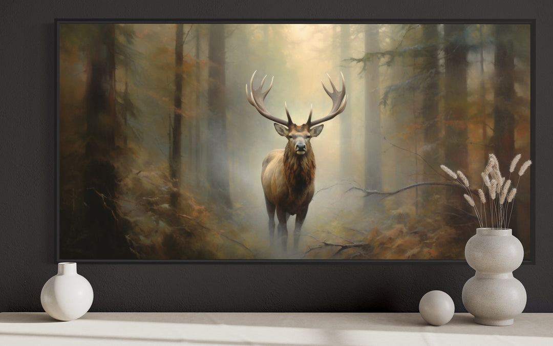 Large framed canvas wall art of a majestic elk standing in a foggy, rustic forest scene.