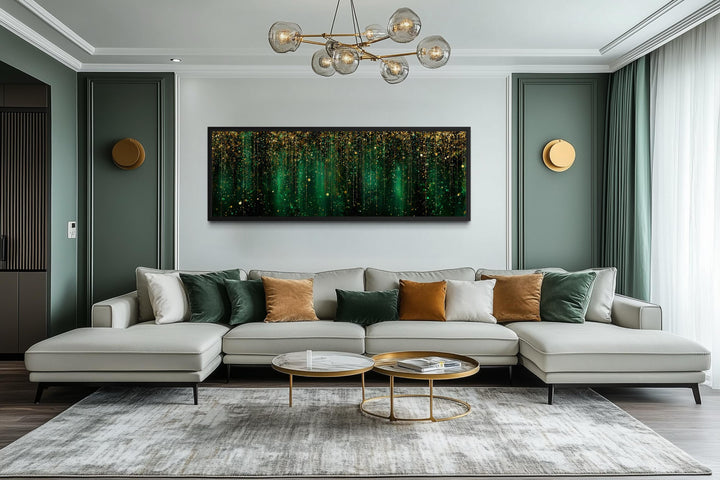 Emerald green and gold abstract rain pattern long horizontal canvas wall art above a modern couch.