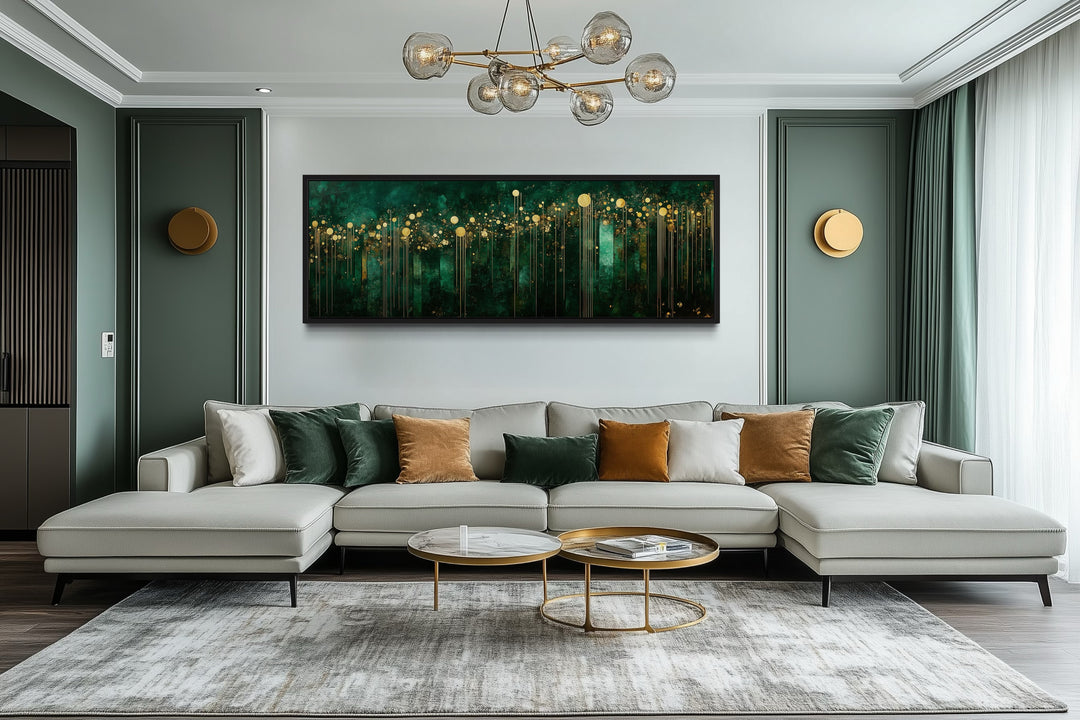 Horizontal emerald green and gold art deco framed canvas wall art above a modern living room sofa.