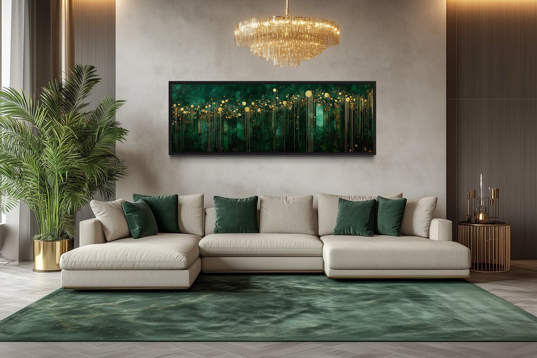 Horizontal emerald green and gold art deco framed canvas wall art above a cream sectional sofa.