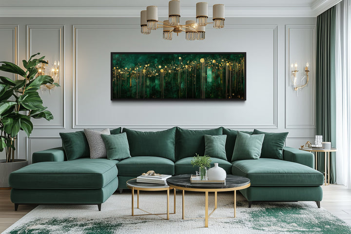 Emerald green and gold horizontal art deco framed canvas wall art hanging above a green sofa.
