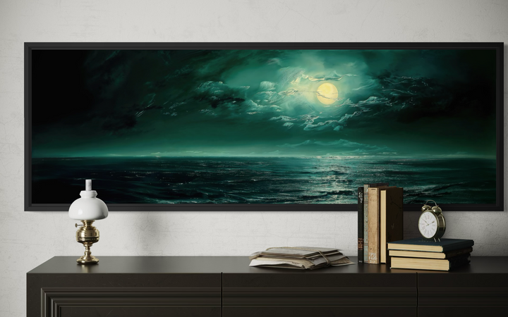 Panoramic emerald green ocean seascape wall art with a glowing moon above a dark dresser.