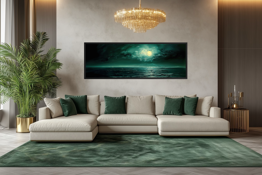 Emerald green ocean seascape wall art with a moonlit sky displayed above a modern sectional sofa.