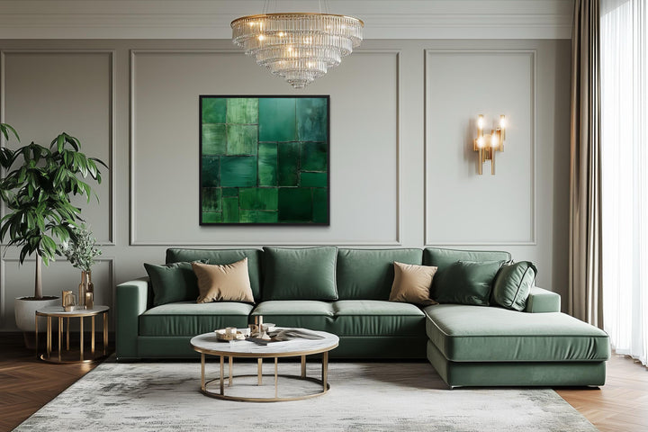 Emerald green modern geometric painting on a square canvas print in a contemporary living room.