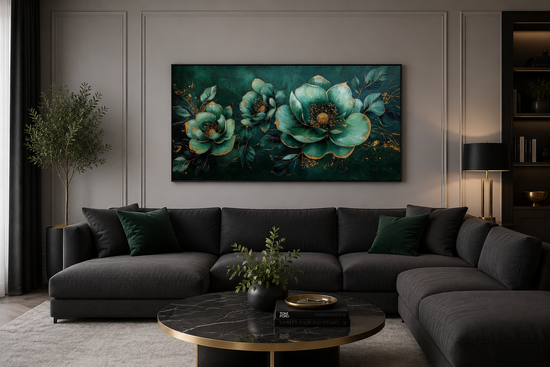 Emerald green and gold Art Nouveau floral canvas print hanging above a dark grey sectional sofa.