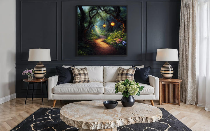 Enchanted forest wall art featuring a glowing lantern path above a modern white sofa.