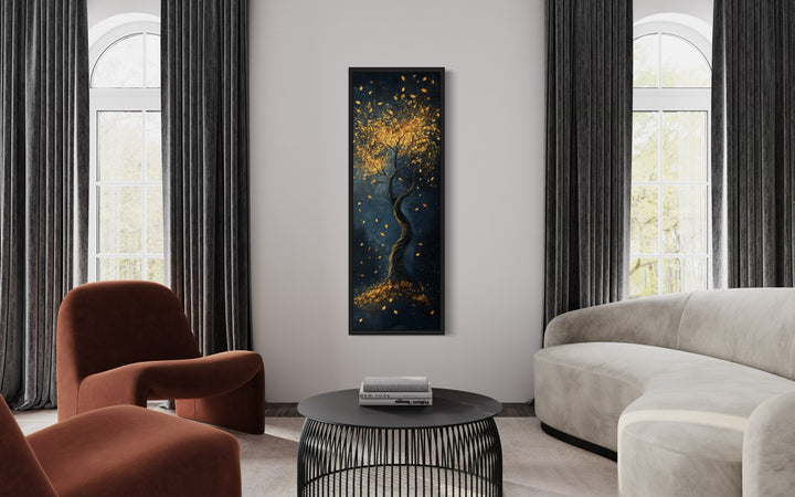 Vertical narrow wall art of an enchanted golden tree on a navy background in a modern living room.