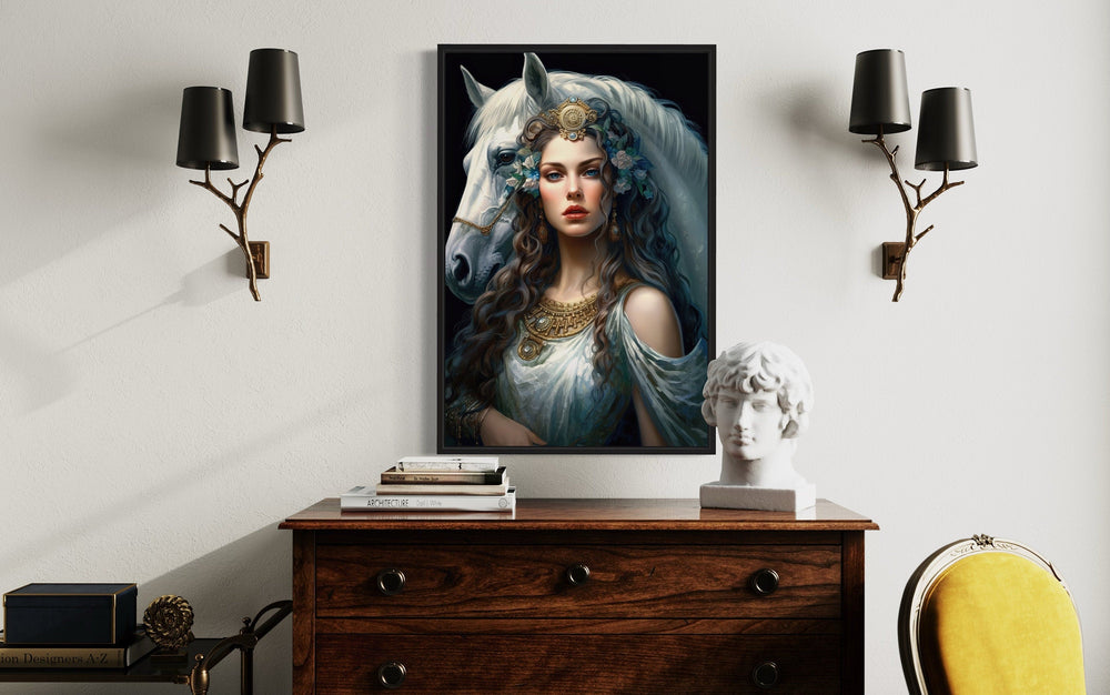 Framed canvas wall art of Epona, Celtic Goddess of Horses, hanging above a wooden dresser.