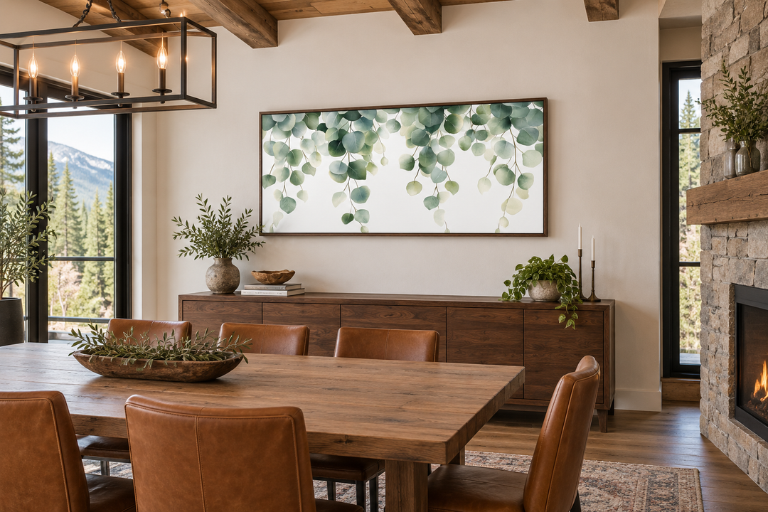 Horizontal framed canvas wall art featuring cascading sage green eucalyptus leaves.