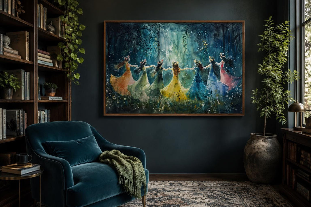 Fairies dancing in a circle in an enchanted forest canvas art above a teal velvet chair.