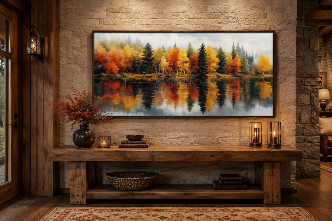 Watercolor autumn forest canvas print above a rustic wooden console table in a cozy room.