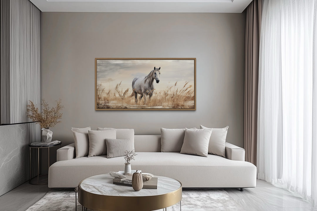 Farm horse in a wheat field farmhouse framed canvas wall art above a modern sofa.