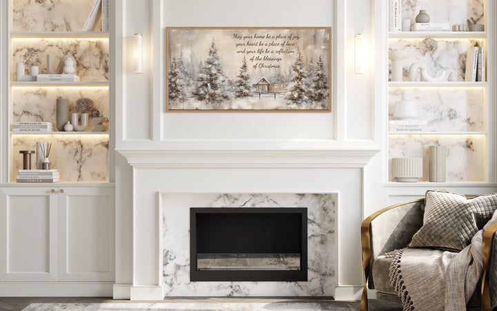 Farmhouse Christmas Eve sign with a winter scene and blessing above a white marble fireplace.