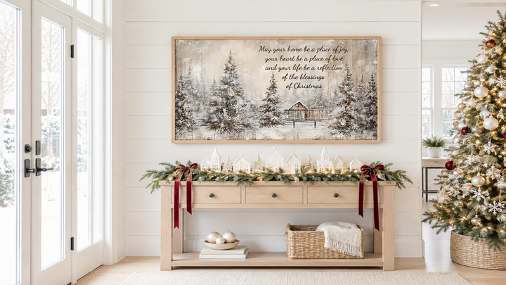 Farmhouse Christmas Eve Sign with a snowy winter scene and blessing above a decorated console table.