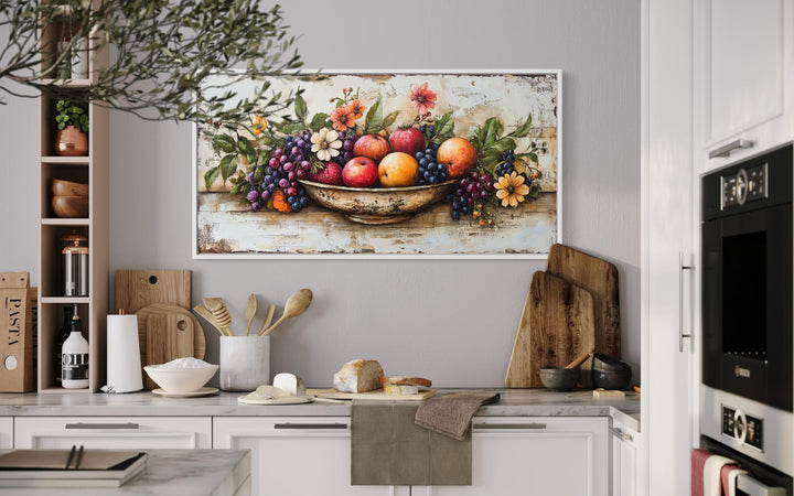 Rustic fruit bowl painting on wood canvas print in a farmhouse kitchen setting.