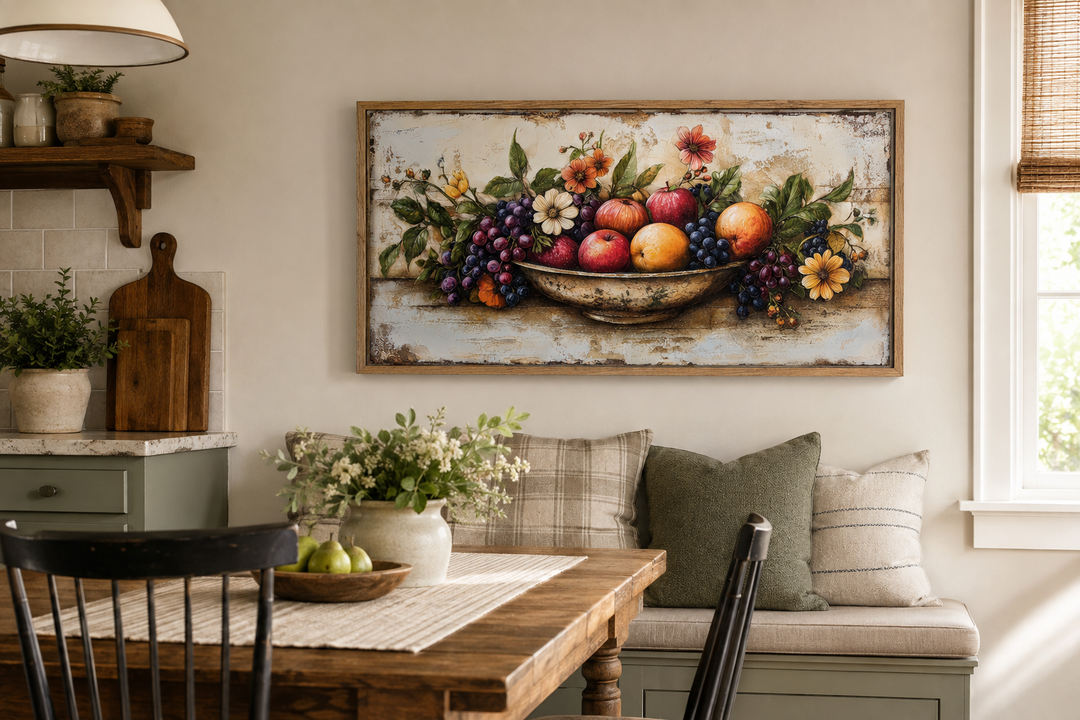 Rustic fruit bowl painting on wood canvas print in a farmhouse kitchen above a dining bench.