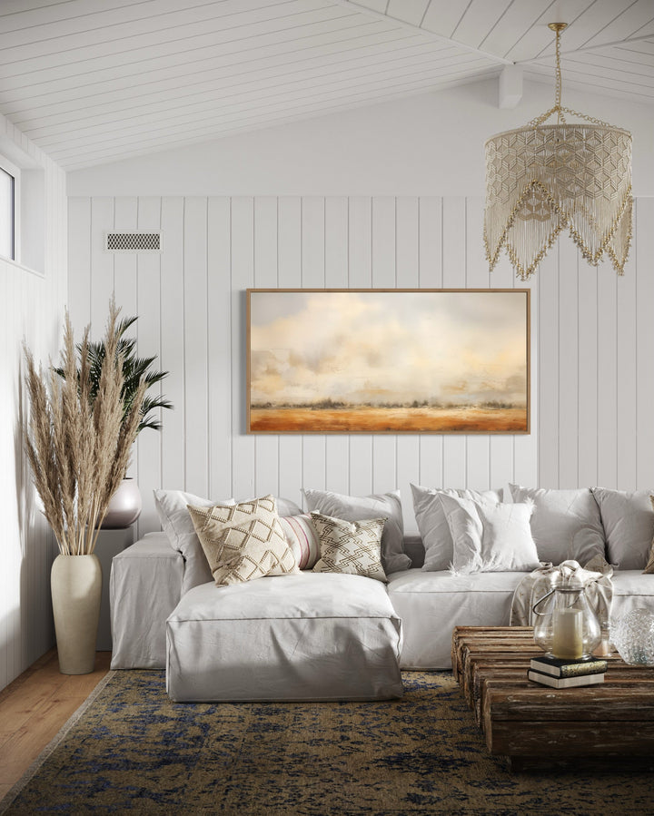 Farmhouse wall art featuring a minimalist, neutral rustic farm field painting.