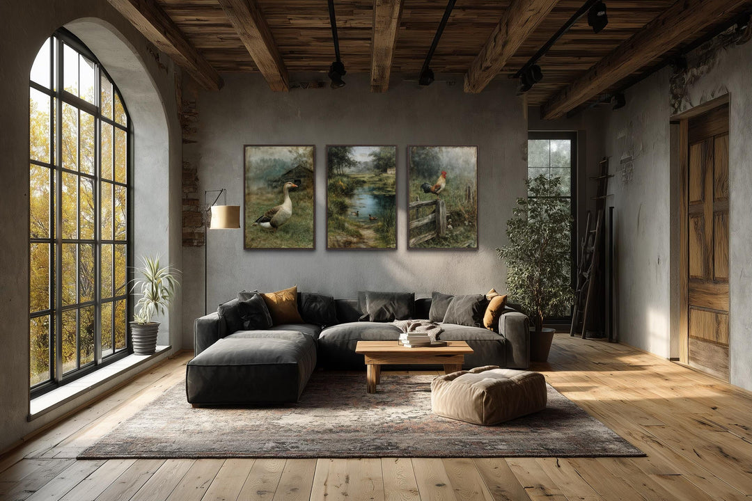 Three framed farmhouse paintings of a goose, ducks on a pond, and a rooster on a fence.
