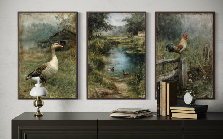Three framed farmhouse paintings of a goose, ducks in a pond, and a rooster on a fence.