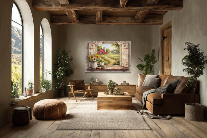 Rustic farmhouse window wall art featuring a red barn and sunflowers in a cozy living room.