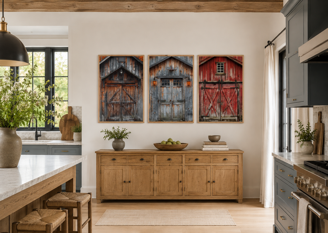 Set of three framed canvas paintings featuring rustic red, brown, and grey barn doors on a wall.