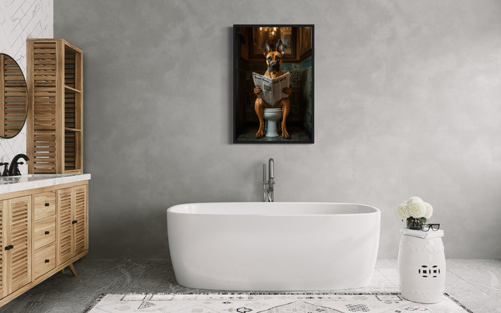 Fawn Great Dane On The Toilet Reading Newspaper Picture in a bathroom with a tub and a painting on the wall