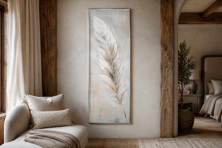 Tall vertical framed canvas art featuring a white feather on a rustic, textured wood-grain backdrop.