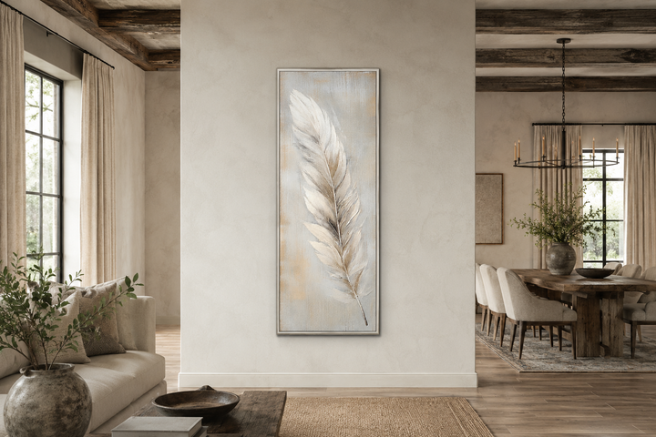 Tall vertical framed canvas wall art featuring a white feather on a rustic wood-textured background.