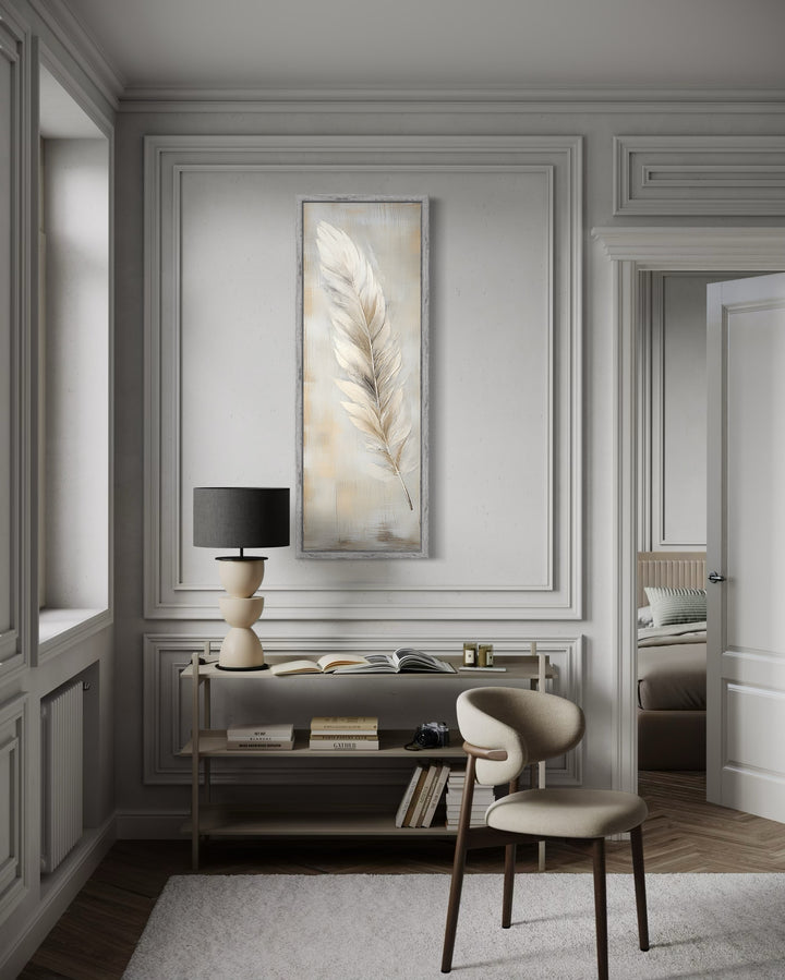 Tall vertical framed canvas wall art featuring a white feather on a rustic wood-textured background.