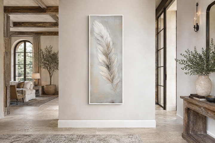 Tall vertical framed canvas wall art featuring a white feather on a rustic wood-textured background.
