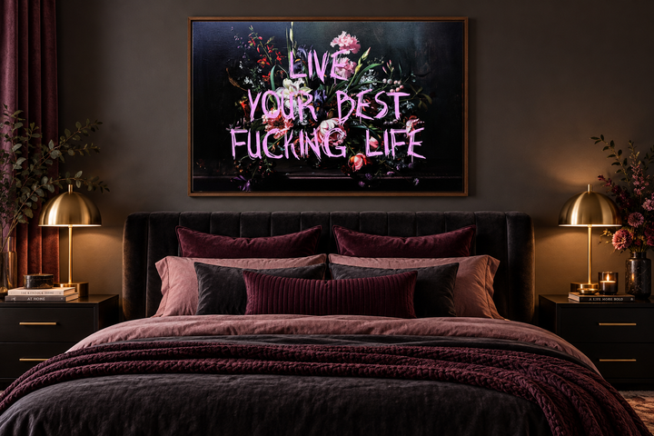 Live Your Best Fucking Life dark academia floral wall art above a bed with pink and purple bedding.