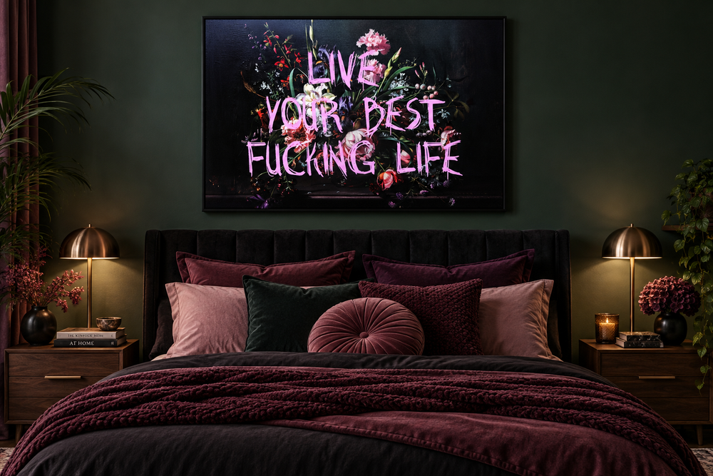 Dark academia floral wall art with pink graffiti text reading Live Your Best Fucking Life over a bed.