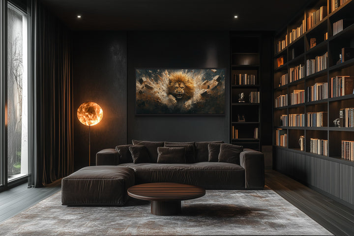 Horizontal framed canvas art of a fierce lion breaking through a brick wall in a dark modern room.