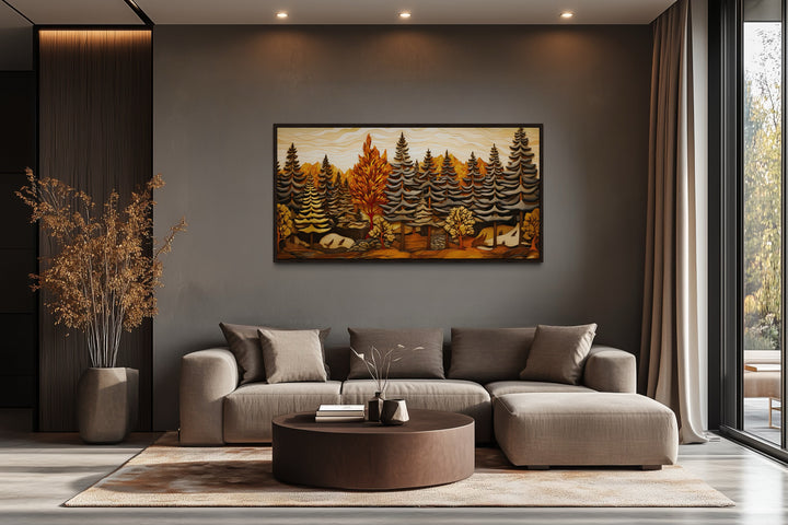 Fir tree forest wall art with a layered wood panel effect in a modern rustic living room.