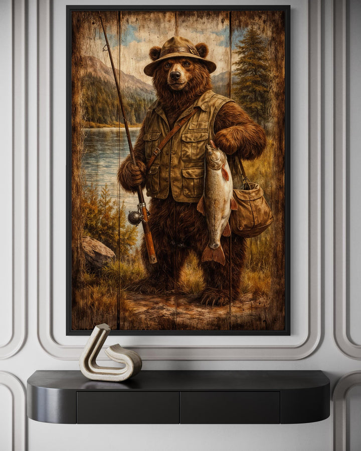 Rustic brown bear fishing wall art in a lodge-style frame above a modern black console table.