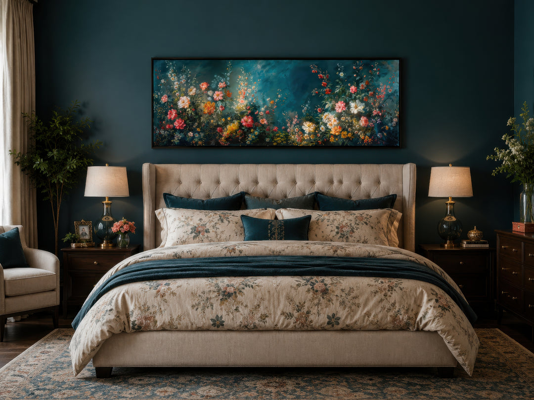 Long narrow canvas wall art featuring a floral garden on a deep teal background above a bed.