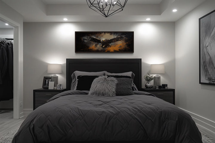 Flying eagle long horizontal canvas wall art above a bed in a modern masculine bedroom.