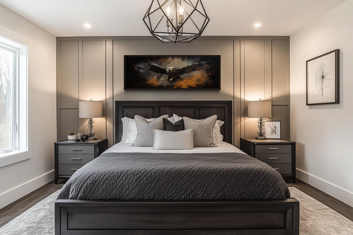 Flying eagle horizontal canvas wall art above a bed in a modern masculine bedroom.