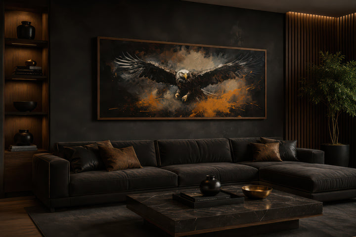 Flying eagle long horizontal canvas wall art in a dark, modern living room above a black sofa.