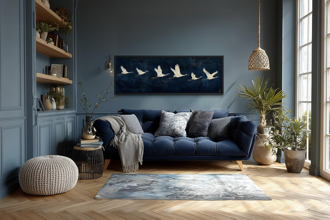 Panoramic navy blue canvas print featuring a horizontal procession of flying white cranes.
