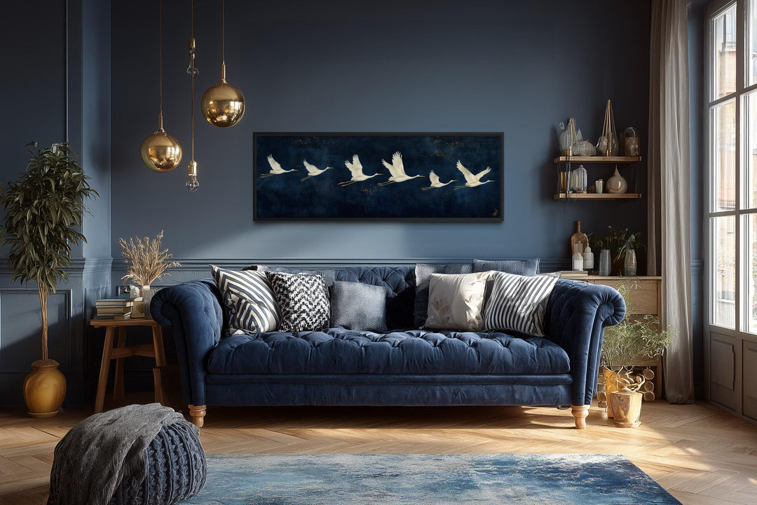 Panoramic navy blue canvas print featuring a horizontal procession of flying white cranes.