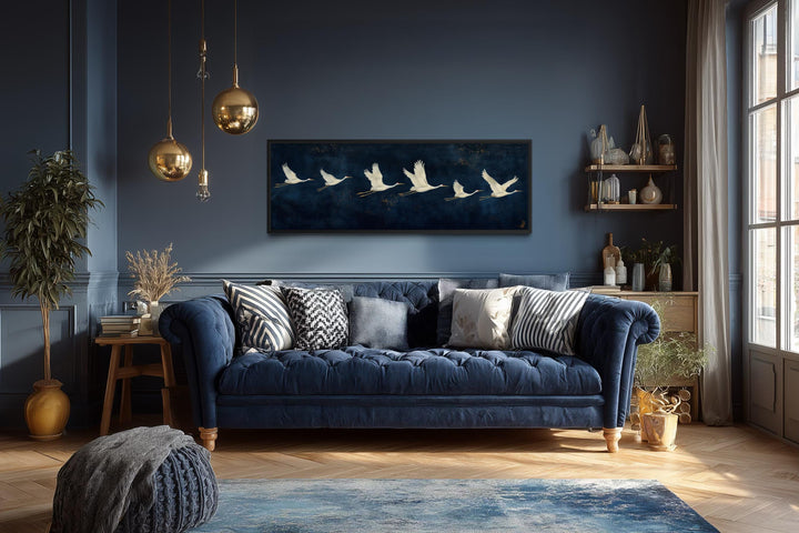Panoramic navy blue canvas print featuring a horizontal procession of flying white cranes.