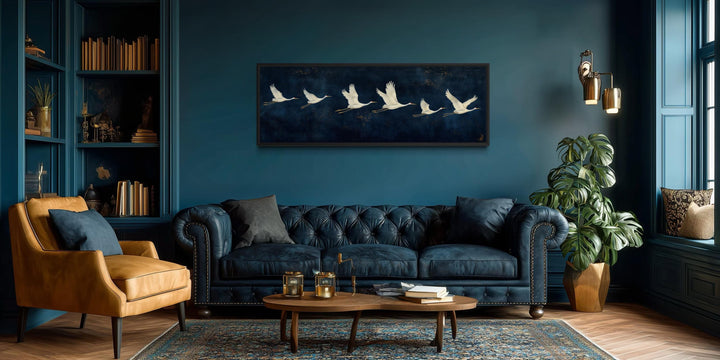 Panoramic navy blue canvas print featuring a horizontal procession of flying white cranes.